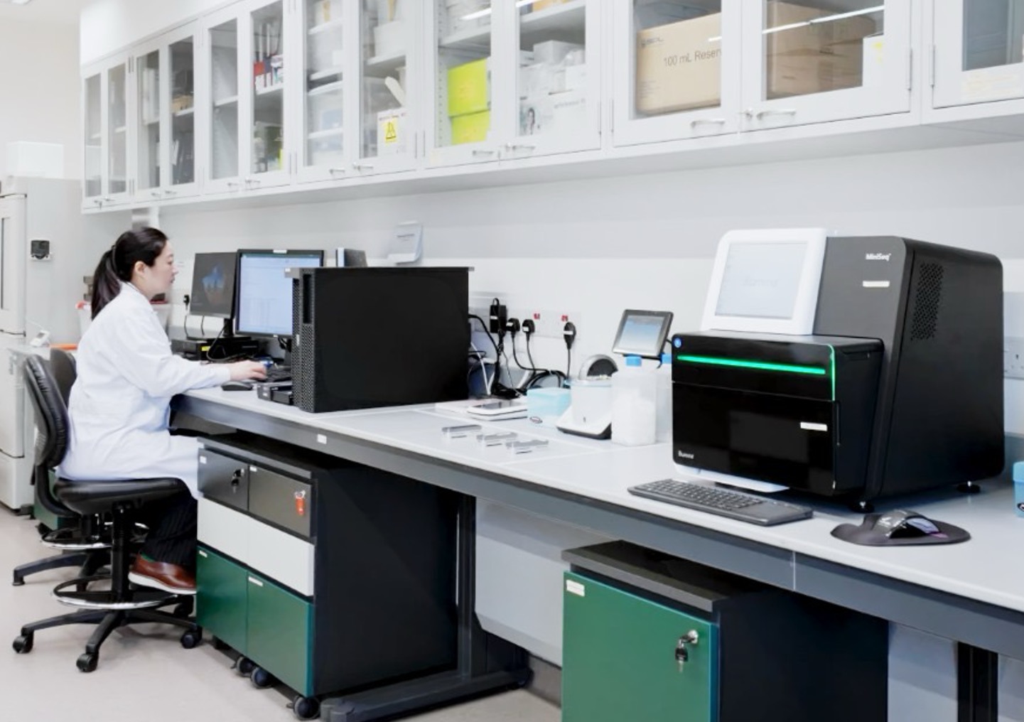 Dr Karrie Ko generating and analysing microbial genomics data in one of the SGH labs