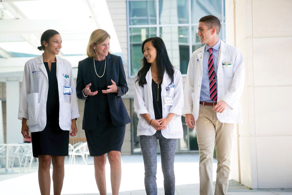 Dean Klotman with students at Duke
