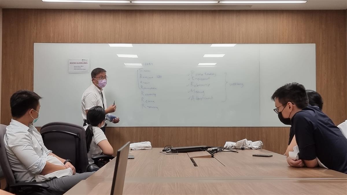 Prof Lee briefing some students from the Class of 2026 before their attachment.