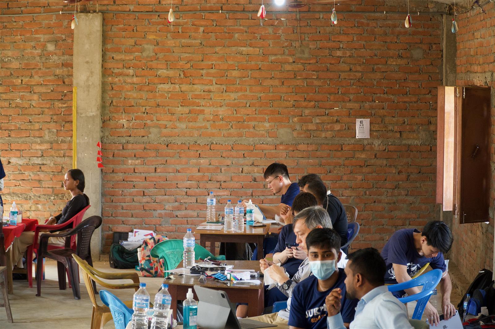 Duke-NUS students and volunteers from Peace Child Ministries conducting a medical camp in Dang, Nepal. // Credit: Project DOVE Nepal, Duke-NUS