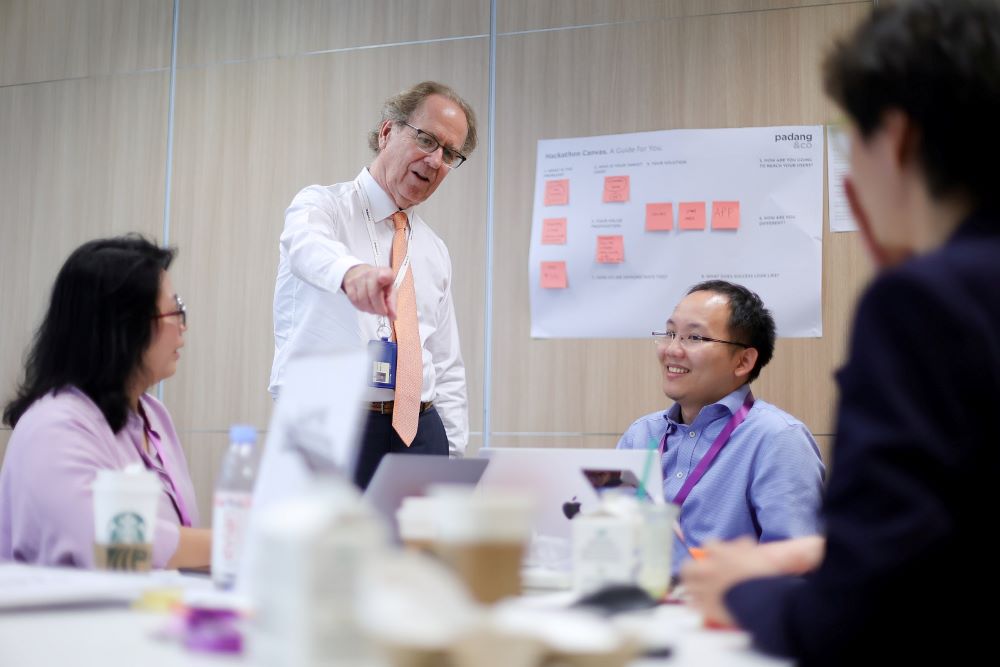 Dean Coffman meeting the team during their hacking session