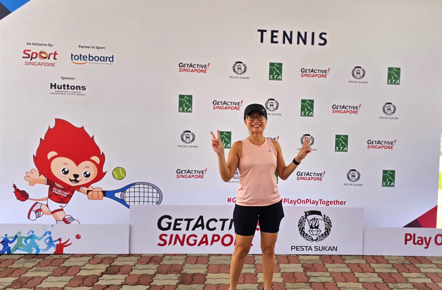 Tay at Pesta Sukan for the Tennis category, looking buoyant and energetic as always. // Credit: Tay Hwee Goon